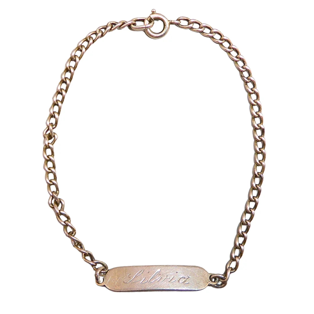 IDENTITÄTSARMBAND AUS 925 SILBER MIT GRAVUR "SILVIA". — Bracelets — Auktionshaus Stuber's Hammerschlag