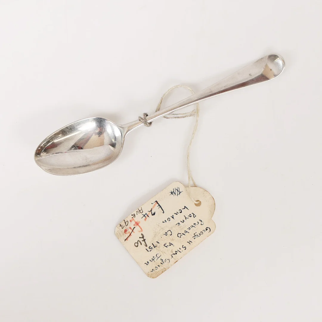 A GEORGE II SILVER TEASPOON. — Silver — Bishop & Miller