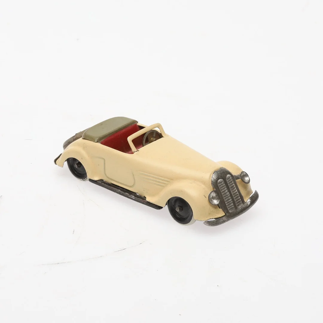 MODELLBIL. Plåt, Lehmann Gnom 811/1, 1:43, Tyskland 1940-tal. — Model cars — Örebro Stadsauktioner