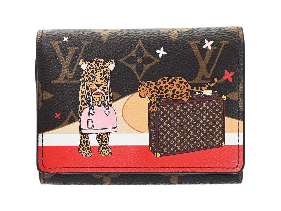 LOUIS VUITTON, PLÅNBOK, Victorine Lion Panter Limited Edition, Monogram canvas, guldfärgade beslag, 12x9x2 cm, märkt NZ4128, år 2018, originalkvitto från 2018, dustbag, originalkartong. Excellent Condition. — Accessoarer/Plånböcker — Kaplans