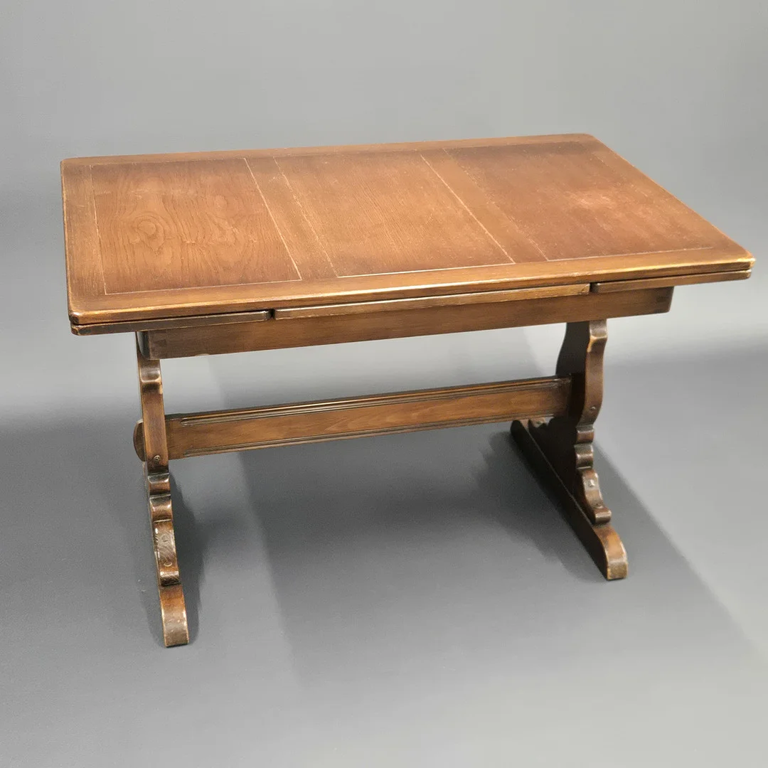 ERCOL GOLDEN DAWN DINING TABLE. — Dining tables — Chalkwell Auctions