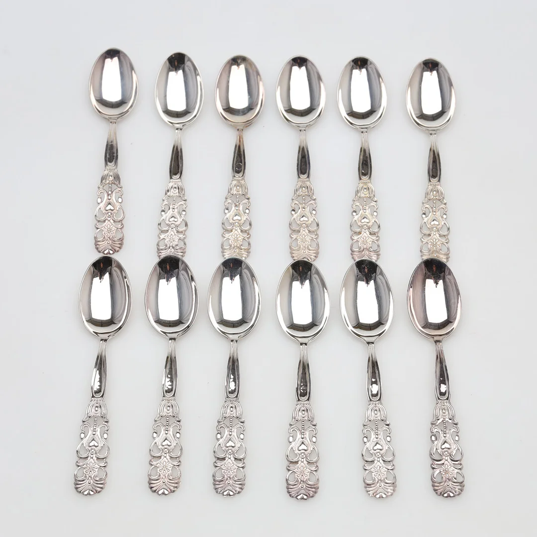 SKEDAR 12 stycken, silver, vikt ca 130 gram. — Silver — Borås Auktionshall
