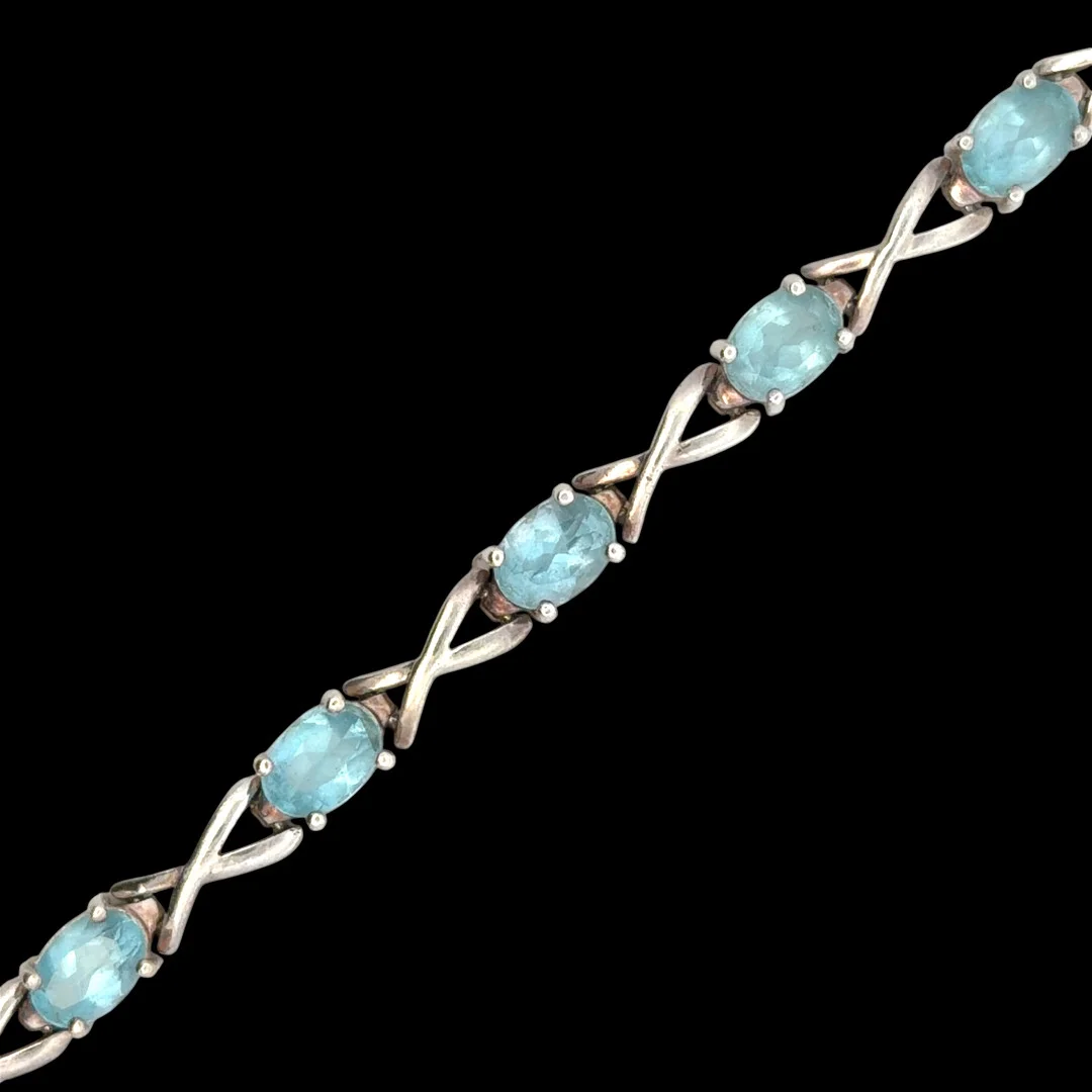 SILVER AND TOPAZ BRACELET. — Bracelets — Griffin’s Auctioneers