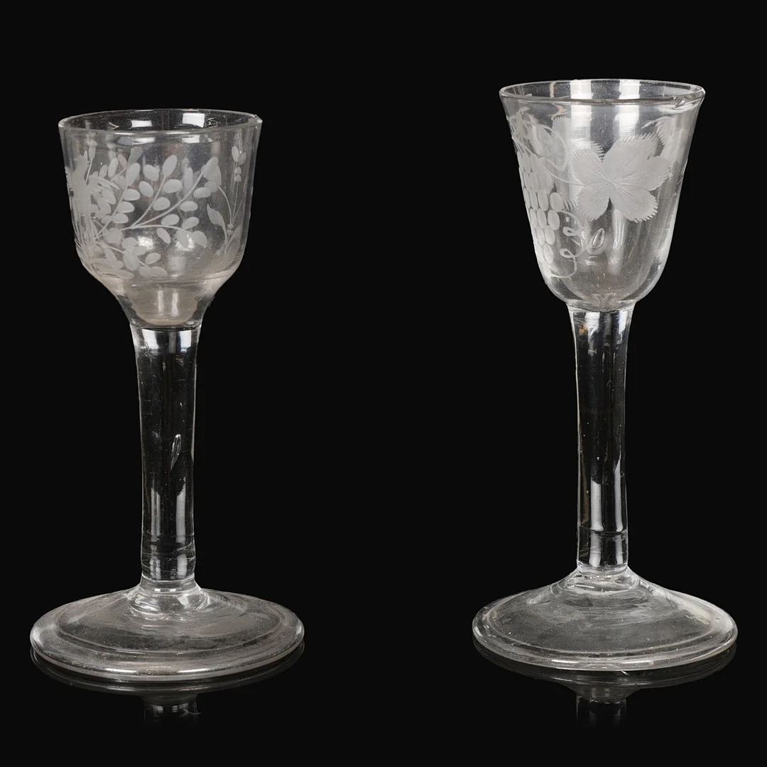 TWO 18TH CENTURY ETCHED DRINKING GLASSES (2). — Art glass — Bishop & Miller