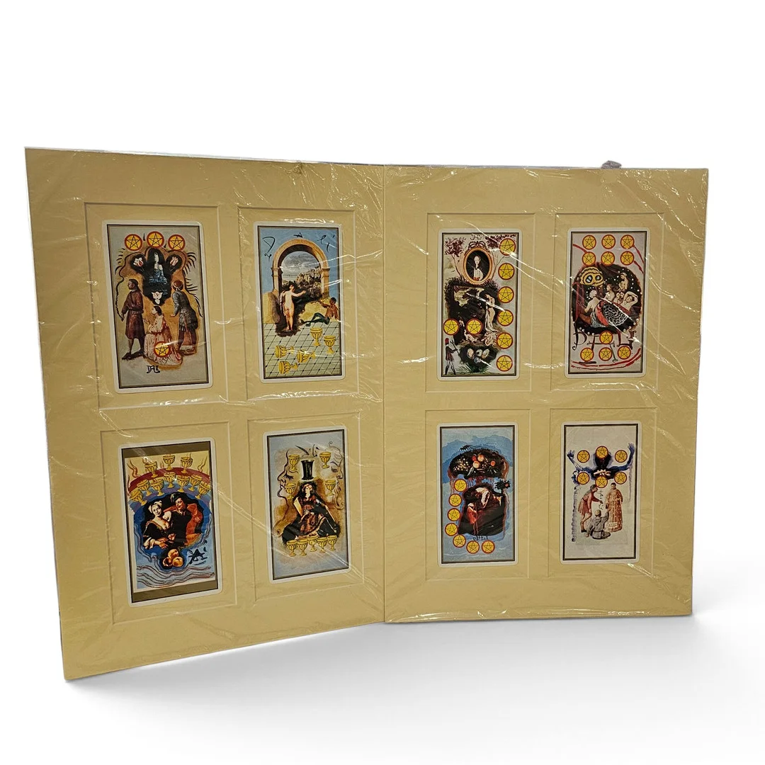 SALVADOR DALÍ. SEGÚN. Ocho cartas del tarot enmarcadas. — Other — Arce Auctions