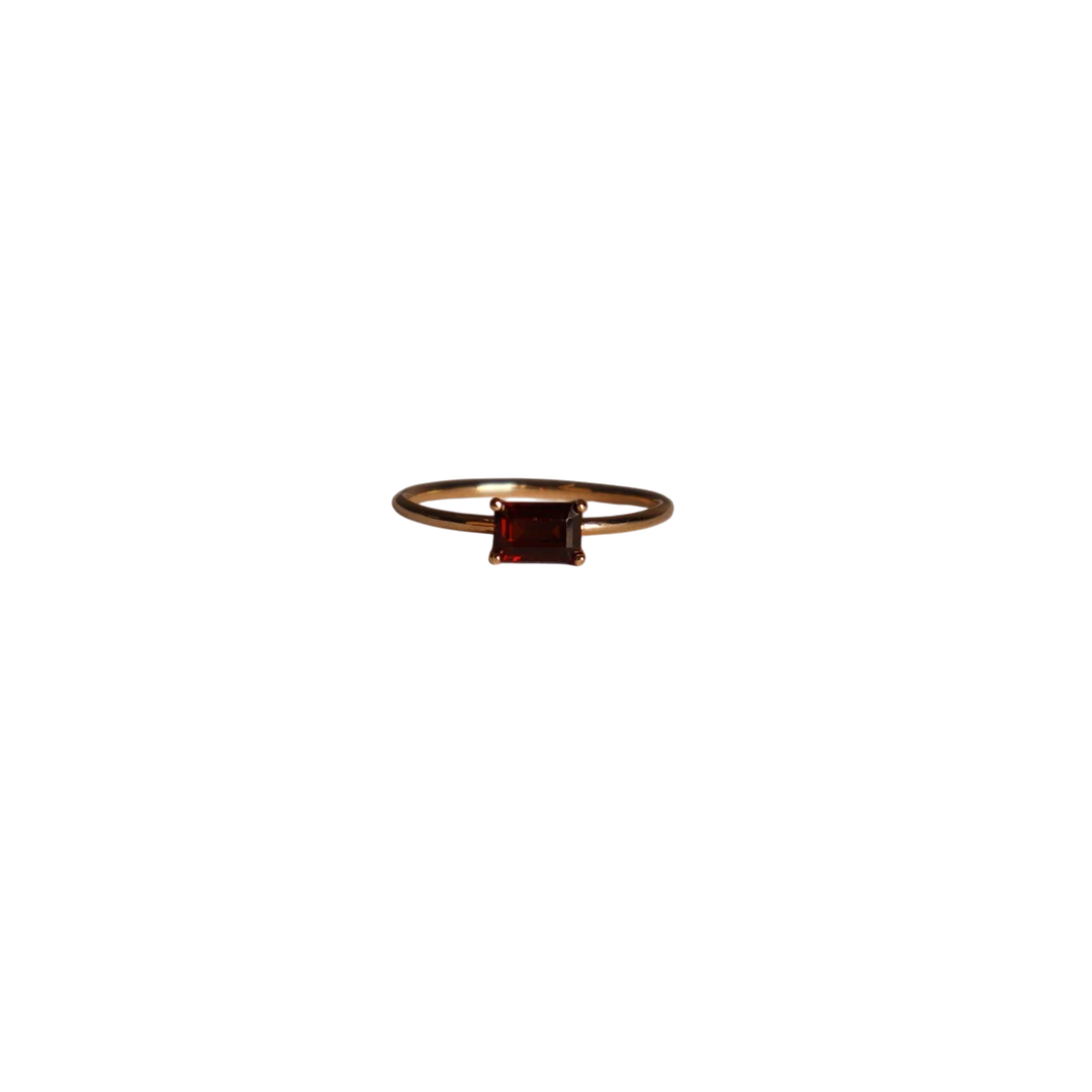 Anillo en oro rosa y granate. — Rings — Barcelona Auctions
