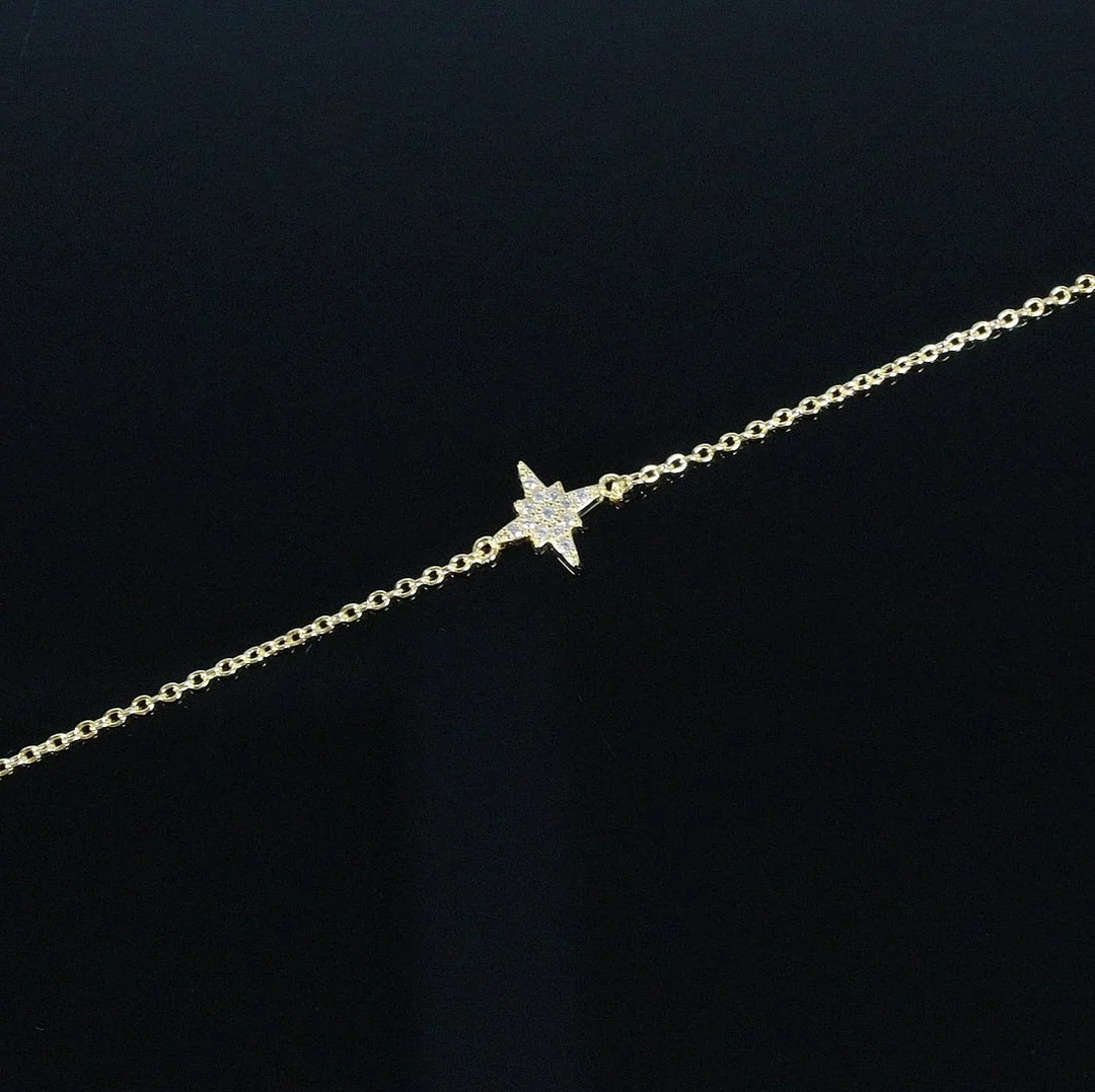 MERALIN JEWELRY. Armband mit Stern, besetzt mit Zirkonia, 925er Sterlingsilber, vergoldet, Italien. — Bracelets — Stockholms Auktionsverk Düsseldorf/Neuss
