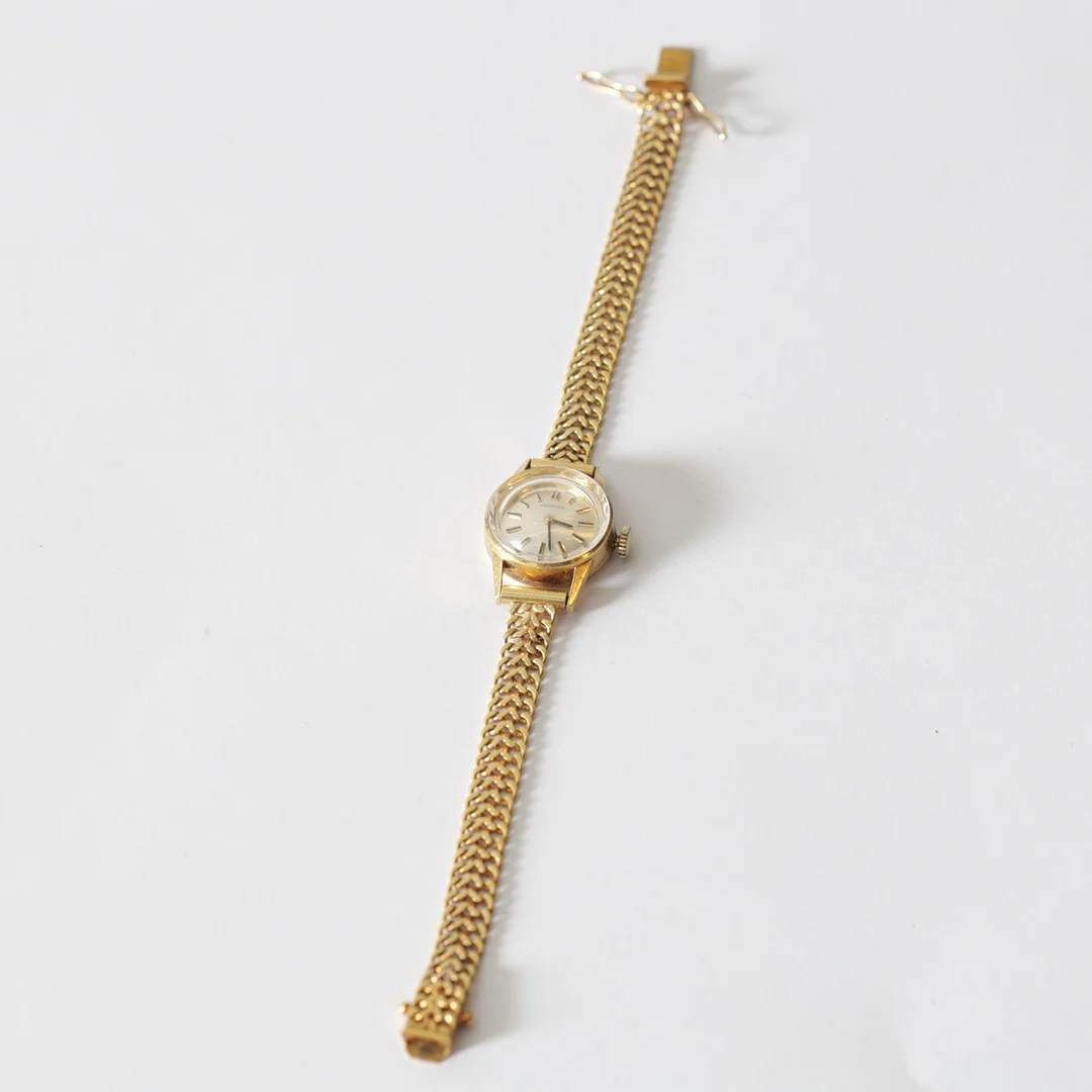 ARMBANDSUR, boett & armband i 18K guld, Certina. Totalvikt ca 20,7 gram. — Wristwatches — Gomér & Andersson Nyköping