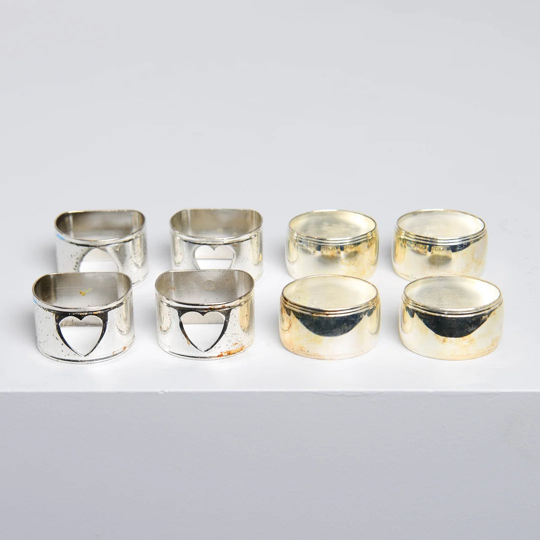 SERVETTINGAR, 10 st, snarlika. — Silver plated — Formstad Auktioner