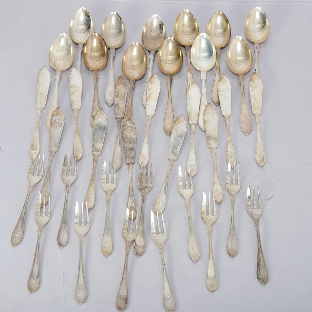 SILVERBESTICK. Stämplade, daterade omkring 1938 (36st). — Silver — Norrlands Auktionsverk