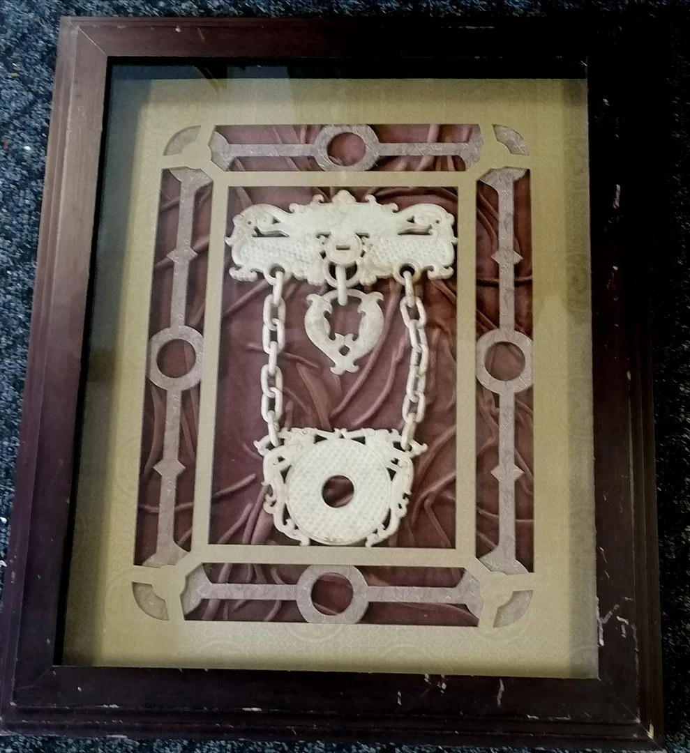 ORIENTAL STONE CARVING MOUNTED IN A LATER FRAME. — Other — Acreman St Auctioneers & Valuers