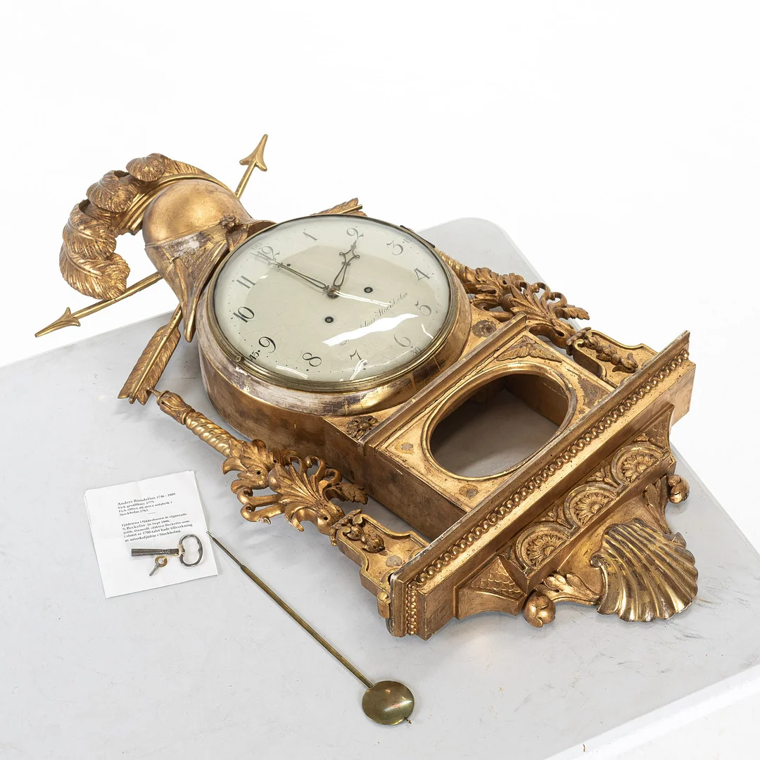 VÄGGPENDYL, förgylld, Anders Rundelius, sengustaviansk, Stockholm, (verksam 1746-1809). — Wall Clocks — Handelslagret Auktionsservice