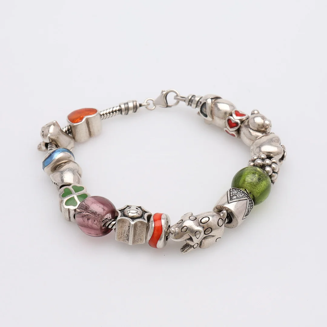 BERLOCKARMBAND, STERLINGSILVER, PANDORA. — Bracelets — Crafoord Auktioner Lund
