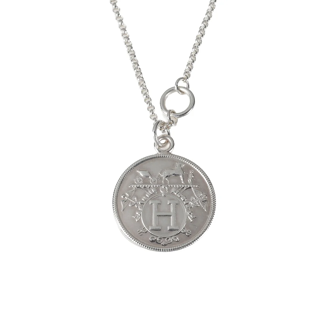 Hermés: A long 'Ex-Libris' medium necklace of sterling silver. Length 89 cm. — Jewellery/Necklaces, pendants — Lauritz