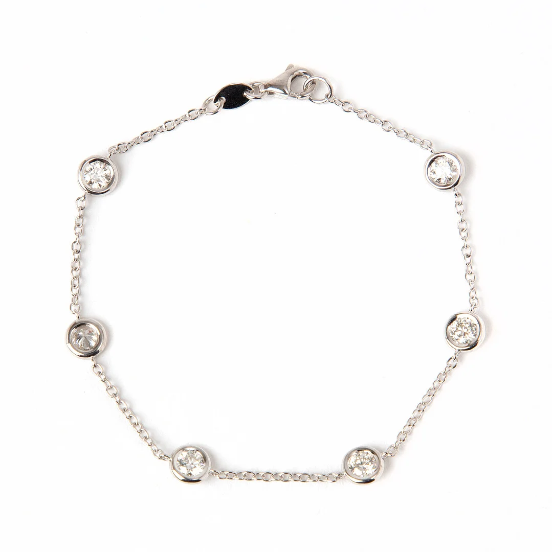ARMBAND, 18K vitguld med briljantslipade diamanter, totalt ca 1.10 ct. — Bracelets — Stockholms Auktionsverk Göteborg