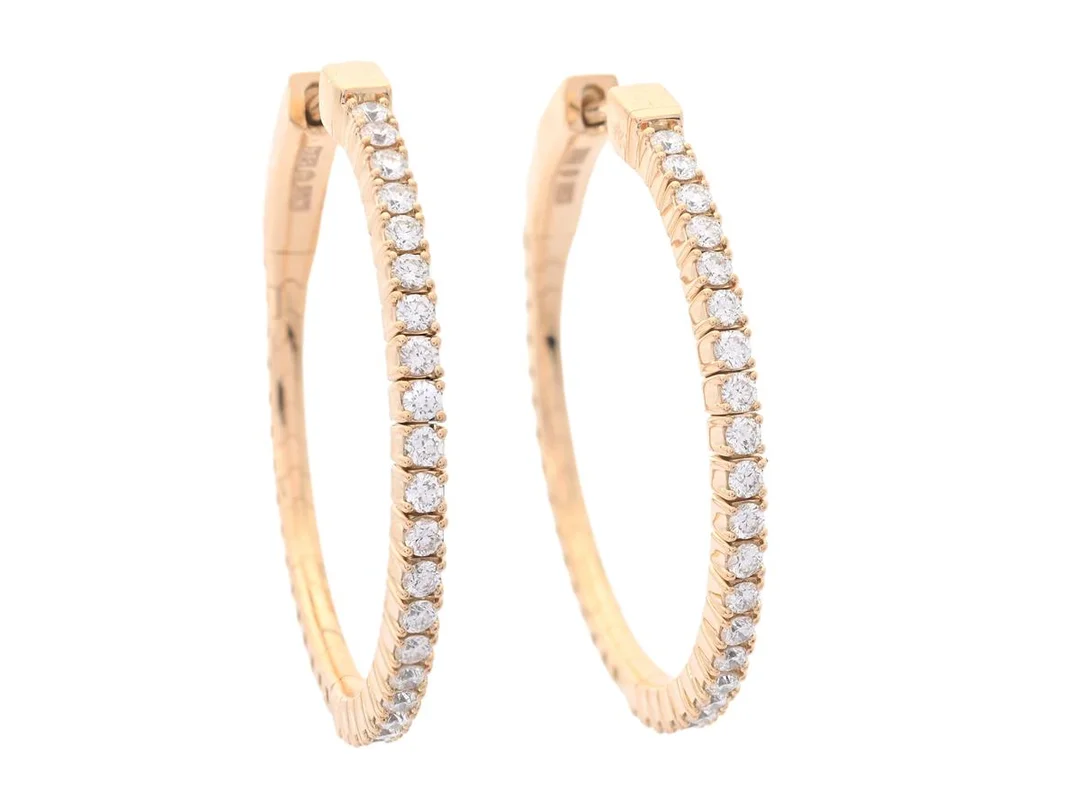ÖRRINGAR, 18K guld, 44 briljantslipade diamanter ca 0,82 ctv, ca TW-W/VVS-VS, stift, diameter 30 mm, vikt 9,0 g. — Smycken/Örringar — Kaplans
