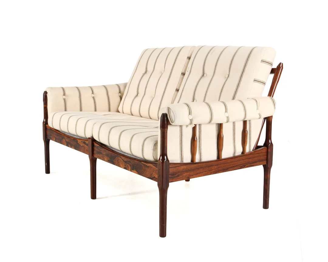 Danish furniture manufacturer. Two-seater slatted sofa, solid rosewood, 1960s. — Furniture/Lounge suites, sofas — Lauritz
