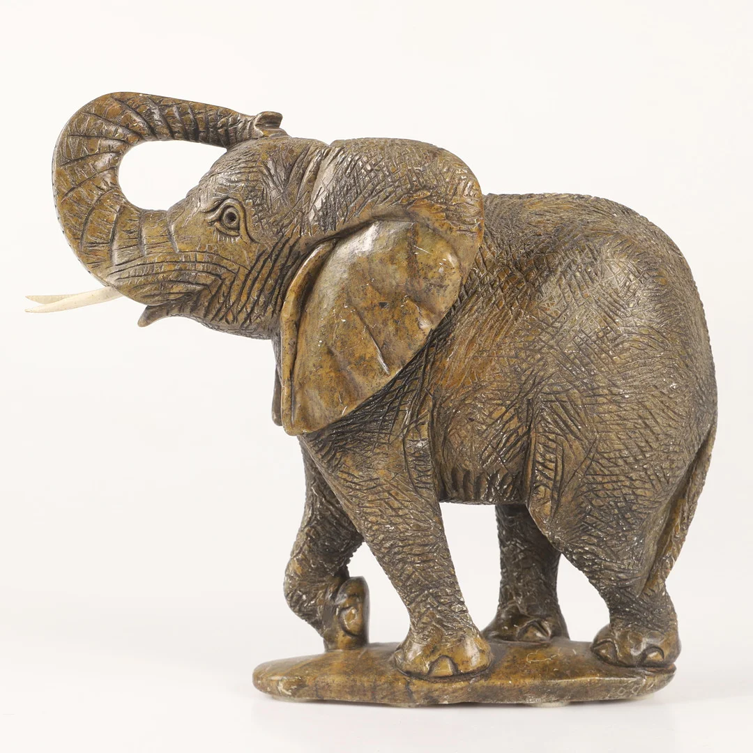FIGURIN, elefant, sten med betar i konstmassa, 1900-tal. — Sculptures & Bronzes — Helsingborgs Auktionskammare