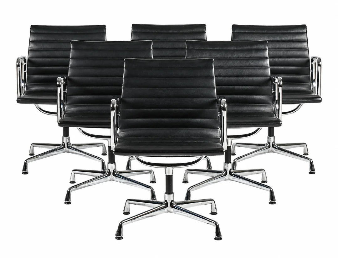 Charles Eames. A set of six EA-108 chairs in black leather, new generation.(6) — Furniture/Chairs — Lauritz