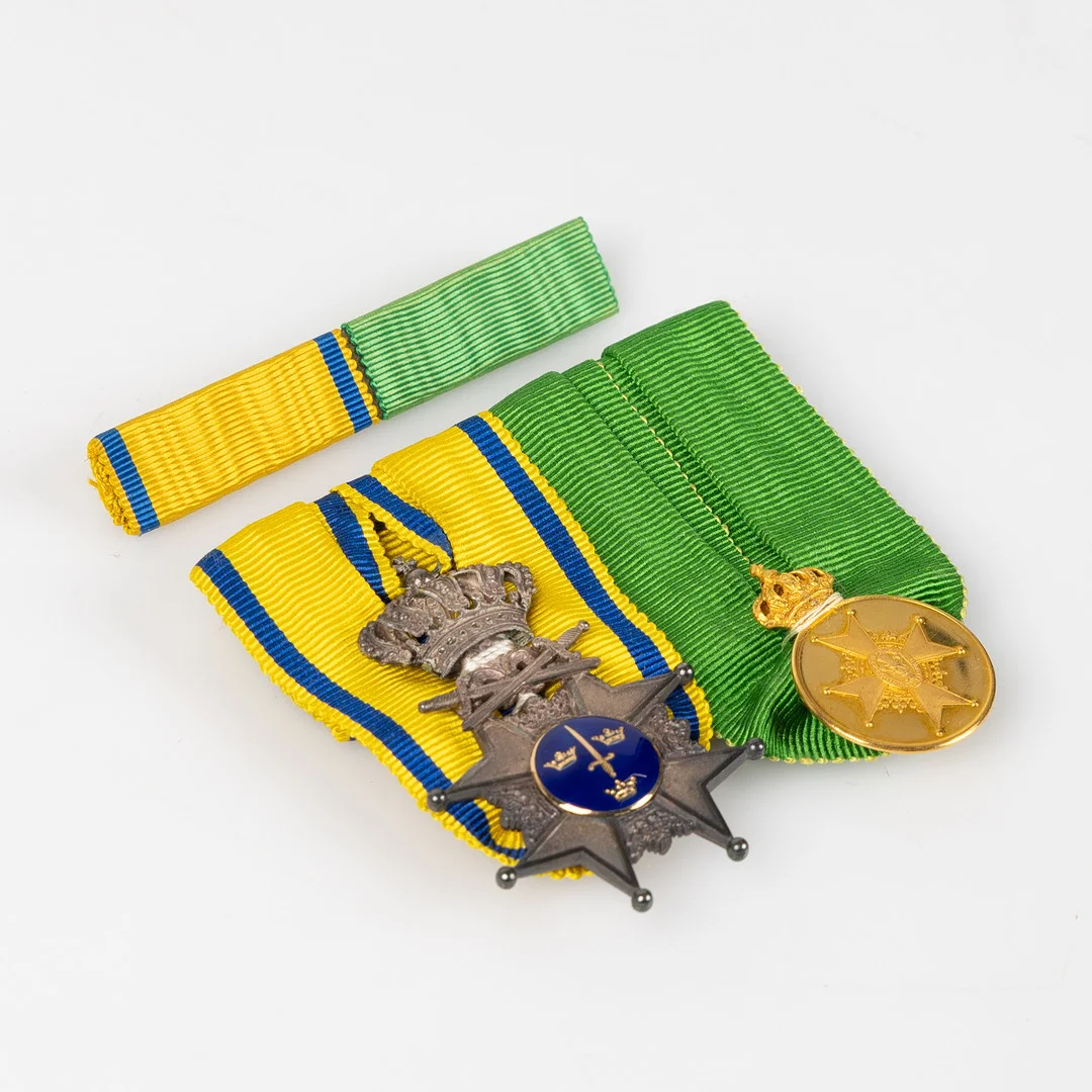 SVÄRDSTECKNET, Sverige, silver, VASAMEDALJEN, Sverige, 18/23k guld, 5:e storleken. — Orders & Medals — Stockholms Auktionsverk Helsingborg