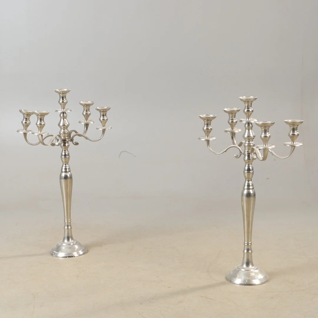 GOLVLJUSSTAKAR, 1 par, metall, 2000-tal. — Candlesticks — Helsingborgs Auktionskammare