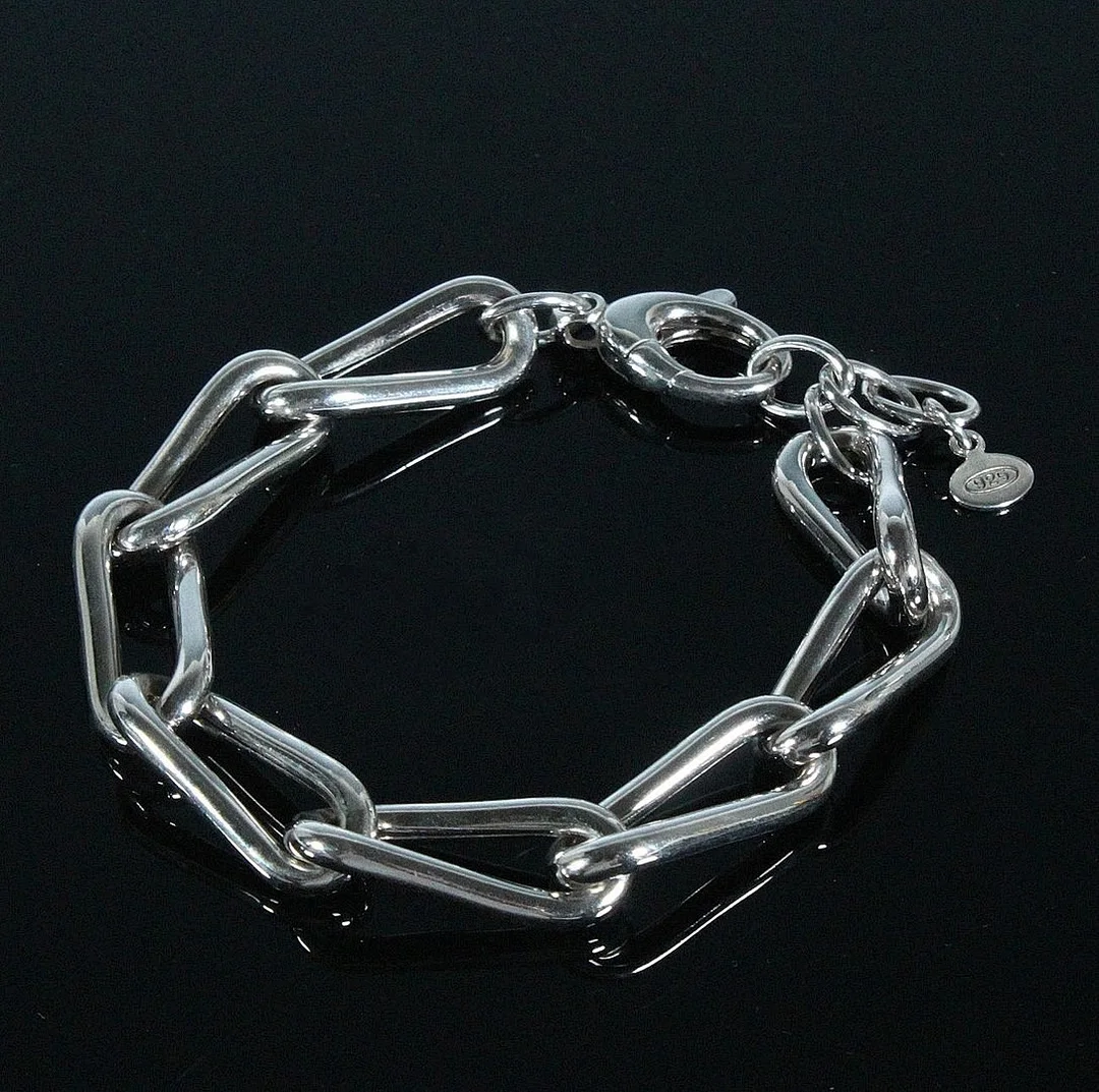 MERALIN JEWELRY. Grobgliedriges Armband aus 925/-Sterlingsilber, rhodiniert. — Bracelets — Stockholms Auktionsverk Düsseldorf/Neuss