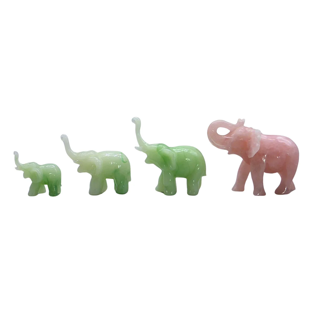 SET AUS VIER ELEFANTENFIGUREN AUS STEIN UND ROSENQUARZ. — African tribal art — Auktionshaus Stuber's Hammerschlag