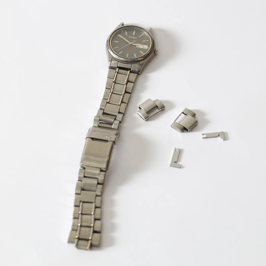 ARMBANDSUR, stål, Seiko Titanium. — Wristwatches — Gomér & Andersson Nyköping