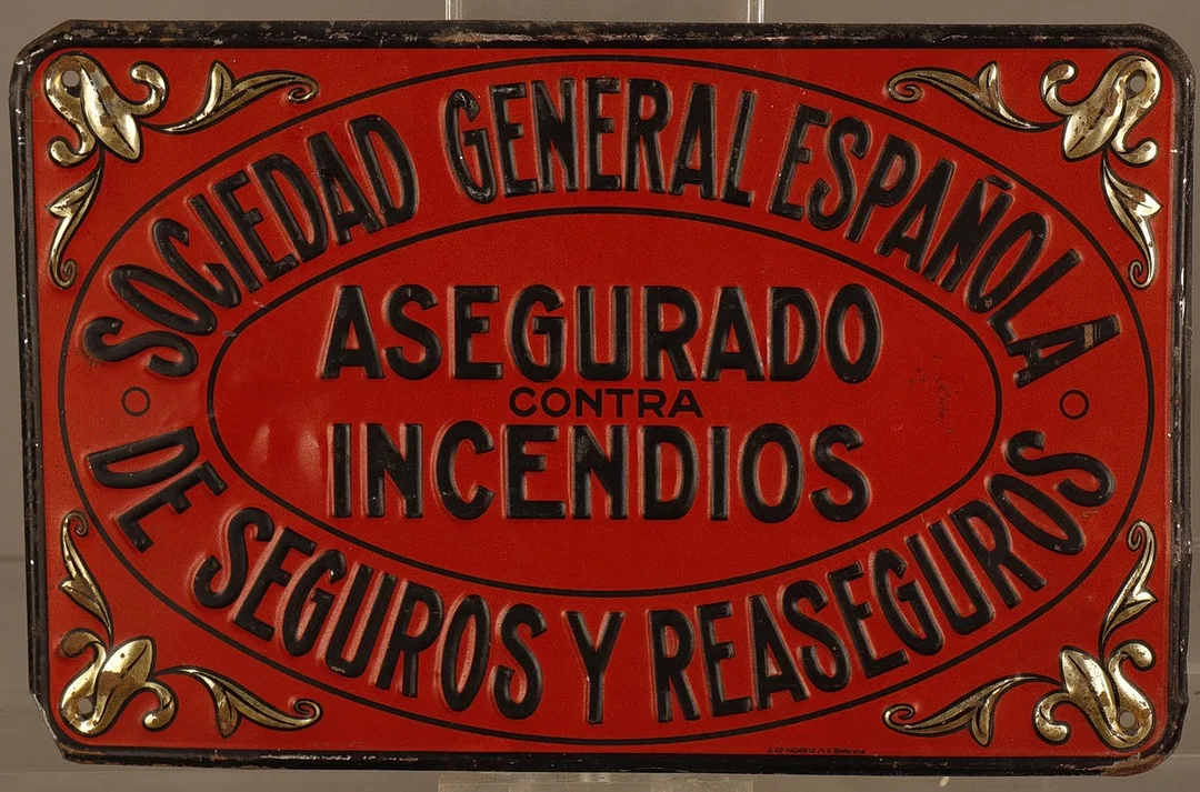 Sociedad General Española de Seguros y Reaseguros, placa publicitaria en hojalata estampada y pintada. — Other collectables — Barcelona Auctions