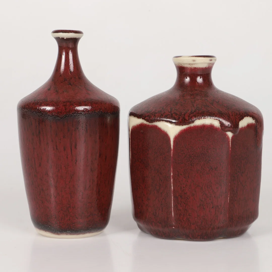 ROLF PALM. Vaser, 2 stycken, oxblodsglaserad keramik, Mölle, signerade, 1989-90. — European — Helsingborgs Auktionskammare