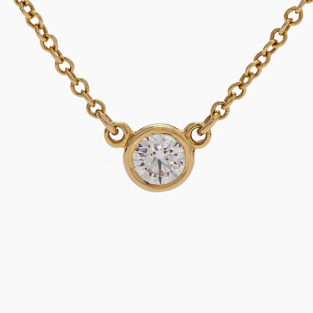 Tiffany & Co, Elsa Peretti, halsband, "Diamonds by the Yard", 18K guld med en briljantslipad diamant. — Smycken/Collier & Hängsmycken — Bukowskis
