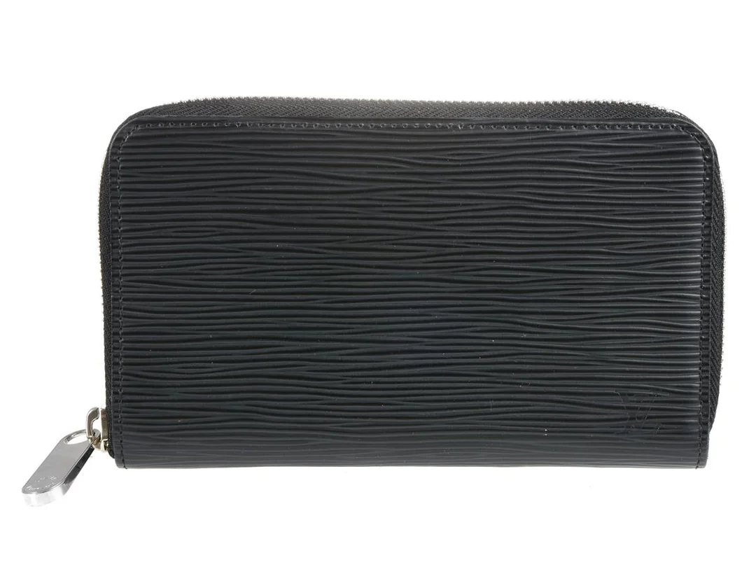 PLÅNBOK, LOUIS VUITTON, Zippy Wallet, svart epi läder, silverfärgade beslag, märkt MI2113, år 2013, kvitto från 2014, dustbag, ask. — Accessoarer/Plånböcker — Kaplans