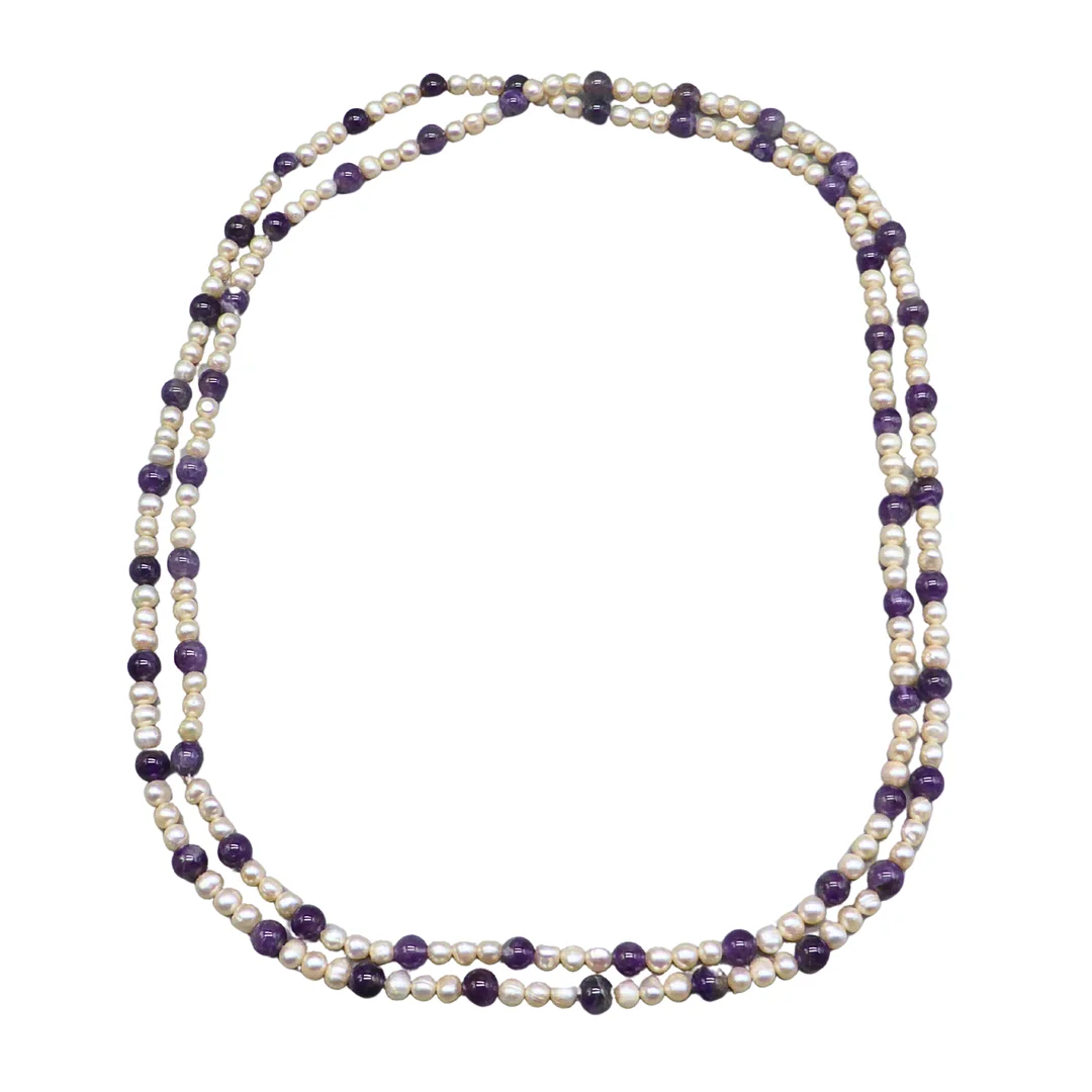 LANGE PERLENKETTE MIT AMETHYST-PERLEN. — Necklace — Auktionshaus Stuber's Hammerschlag