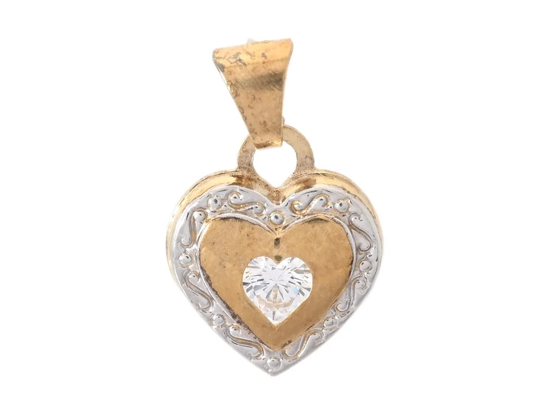 HÄNGE, 18K guld, vit sten, hjärta, detaljer i vitguld, höjd 16 mm, vikt ca 0,4 g. — Smycken/Hänge — Kaplans