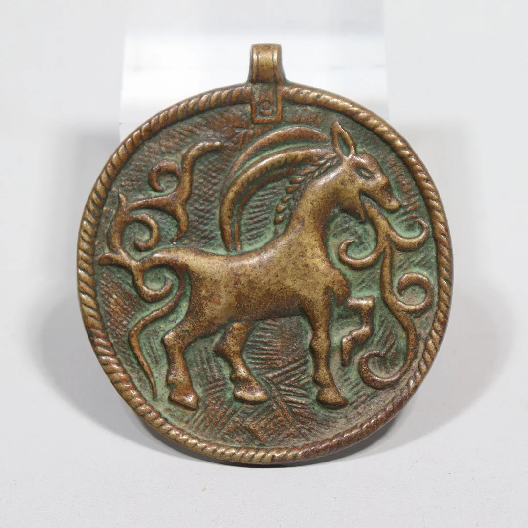 KALEVALA KORU, Finland, hänge i brons, dekor av stenbock. — Necklace — Markus Auktioner