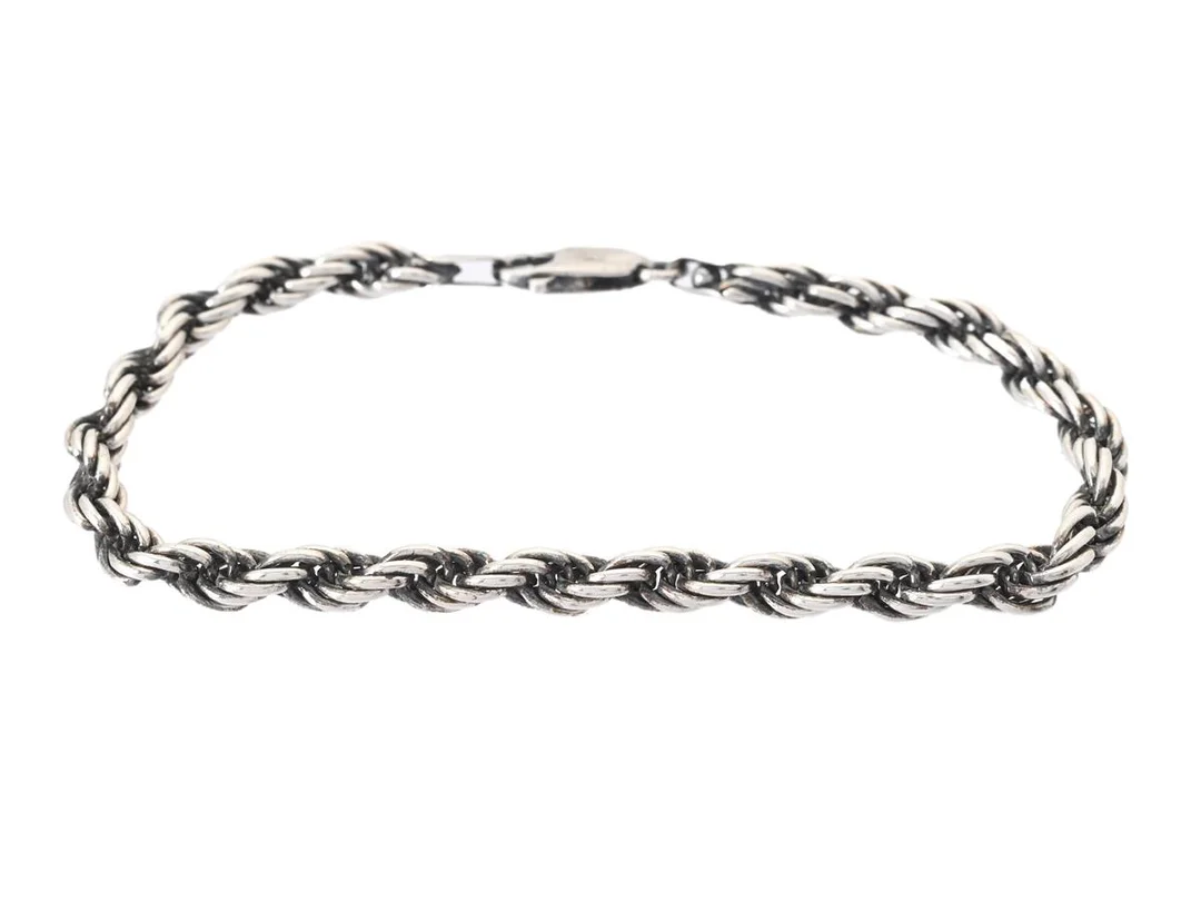 ARMBAND, sterlingsilver, tvinnad, längd 20,7 cm, vikt ca 14,7 g. — Smycken/Armband — Kaplans