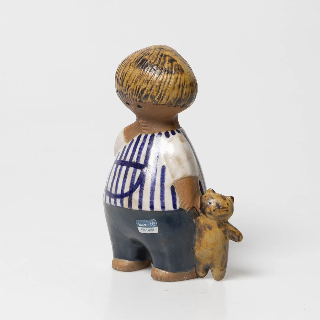 LISA LARSON. Figurin, "Malin", Gustavsberg, delvis glaserat stengods. — Ceramics & Porcelain — Stockholms Auktionsverk Helsingborg