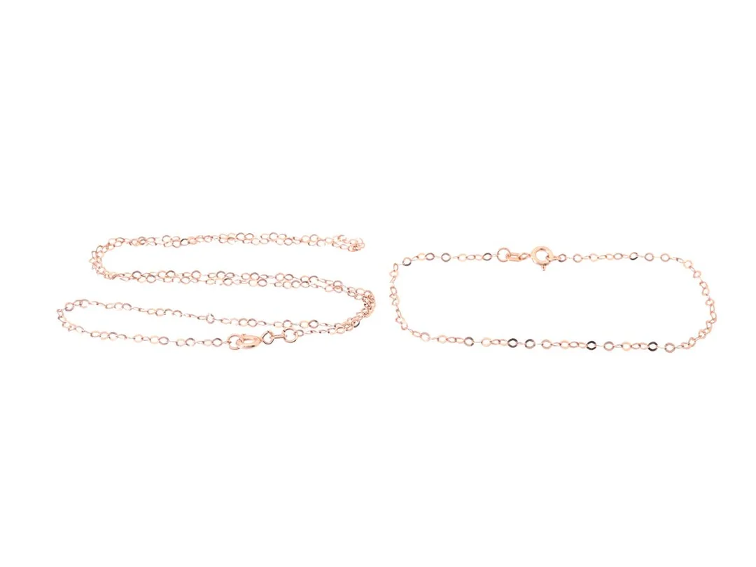 SMYCKESET, förgyllt sterlingsilver, halskedja, armband, roséfärgat, fantasilänk, längd 44,5/18,5 cm, totalvikt ca 1,9 g. — Smycken/Smyckeset — Kaplans
