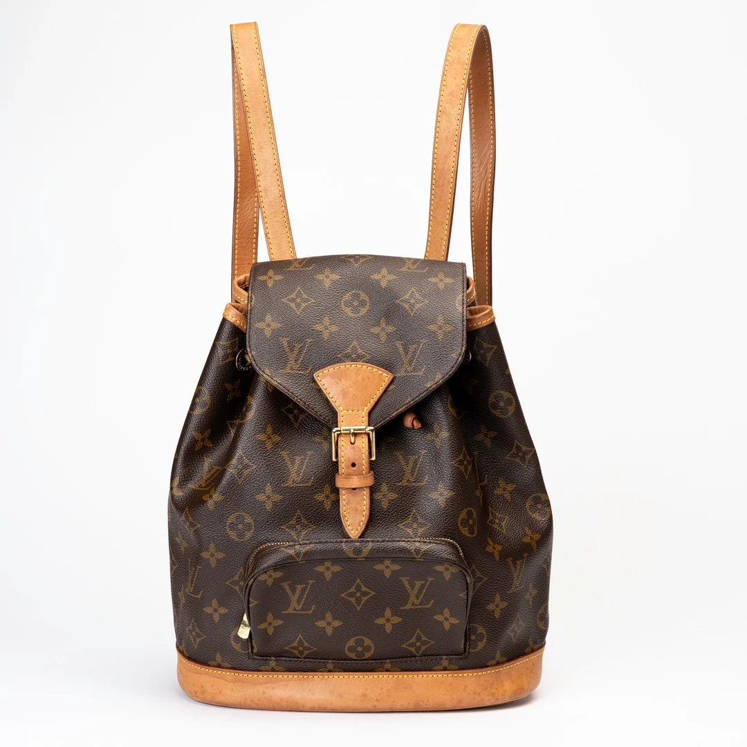 LOUIS VUITTON. Ryggsäck, "Mountsouris", monogramcanvas, detaljer i läder samt guldfärgad metall, Paris, Frankrike, 1999. — Vintage & Designer Fashion — Auktionshuset Kolonn