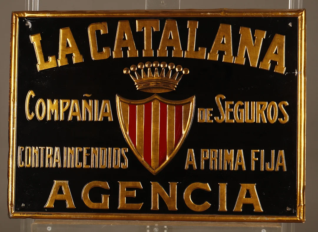 La Catalana, placa publicitaria en hojalata estampada y pintada. — Other collectables — Barcelona Auctions
