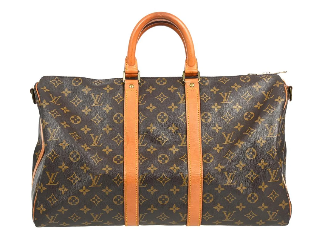 LOUIS VUITTON, VÄSKA, Keepall Bandouliere 45, Monogram Canvas, guldfärgade beslag, 45x20,5x27 cm, märkt FC 893, år 1989, avtagbar axelrem. Good Condition. — Accessoarer/Väskor — Kaplans