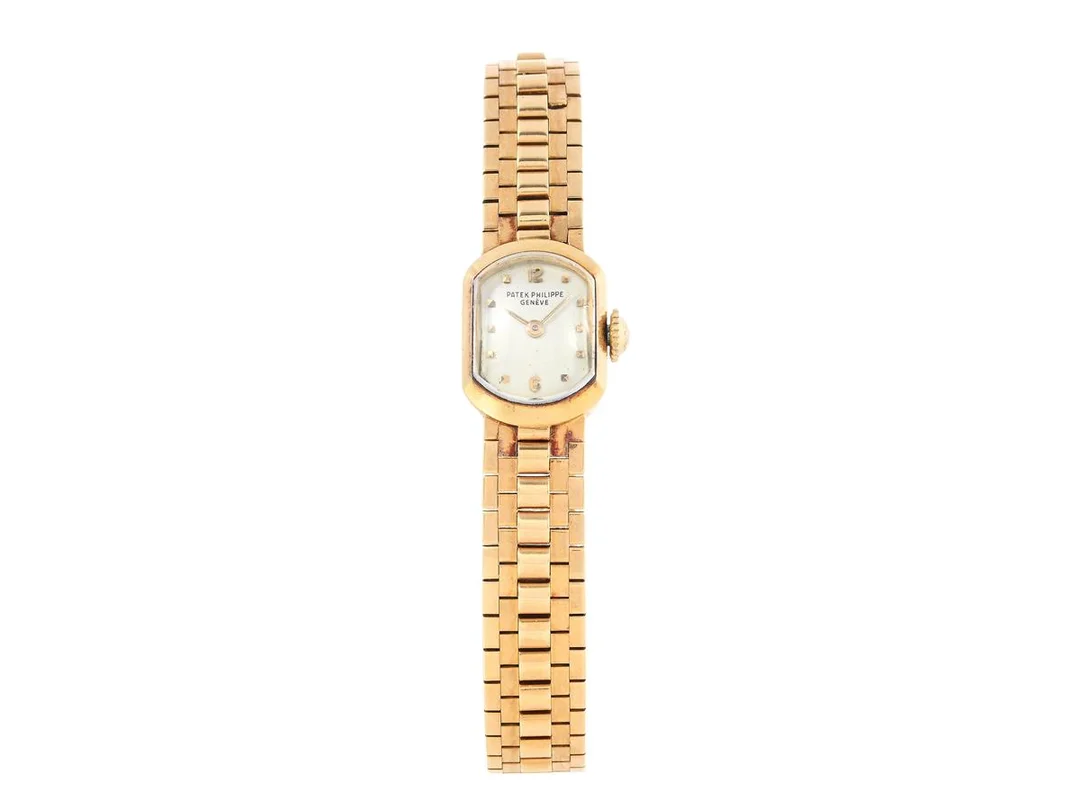 PATEK PHILIPPE, Genève, damur, 14 x 18,5 mm, Serie nr. 947132, Ref nr. 3100, Boett nr. 514001, 18K guld, manuell, safirglas, formverk, integrerad originallänk (Gay Frères), längd 180-185 mm, totalvikt 50,19 gram, ca 1955. — Klockor/Patek Philippe — Kaplans