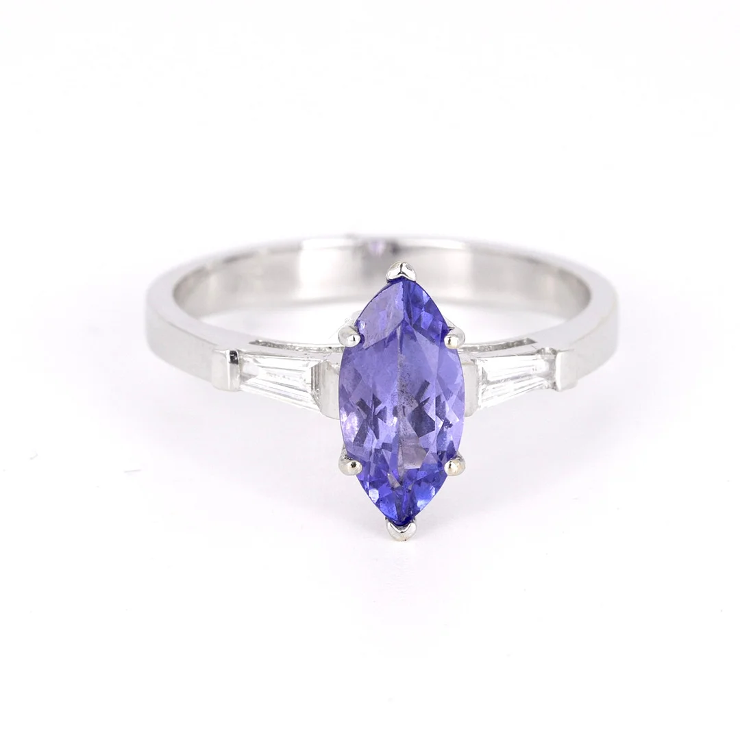 TANZANITE AND DIAMOND 18CT RING. — Rings — Chalkwell Auctions