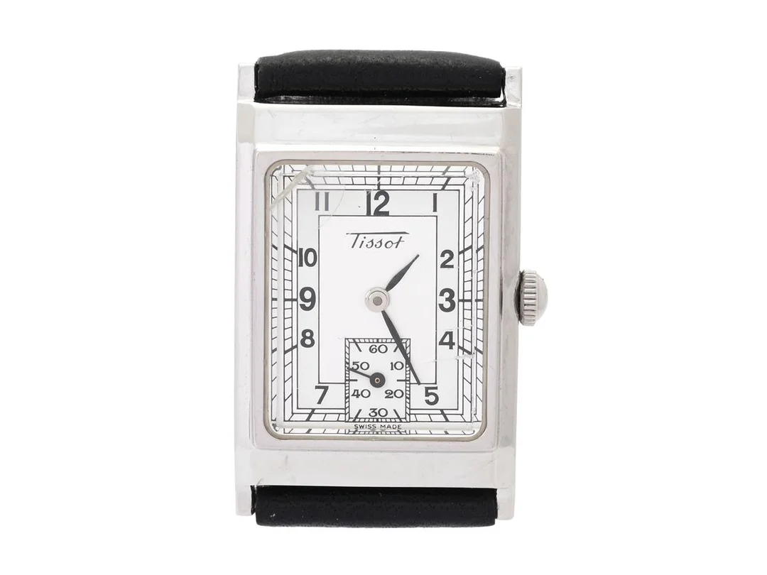 TISSOT, Heritage, Ref nr. T56.1.821.32, Boett nr. Z173W, herrur, 22 x 30 (36) mm, stål, quartz, mineralglas (skadat), liten sekundvisare, läderband, ca 1999. — Klockor/Tissot — Kaplans