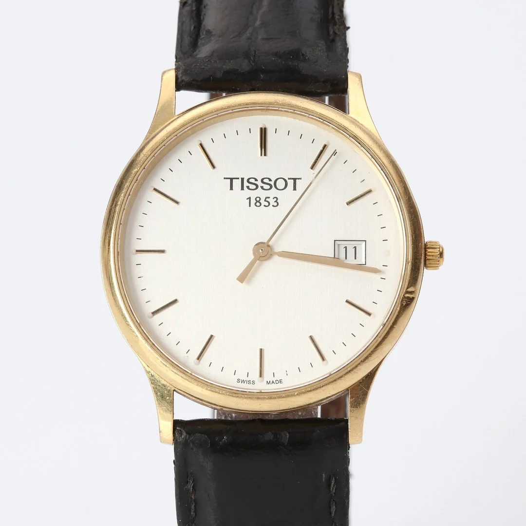 TISSOT, ARMBANDSUR. Boett i 18k guld, quartz. — Wristwatches — Skånes Auktionsverk