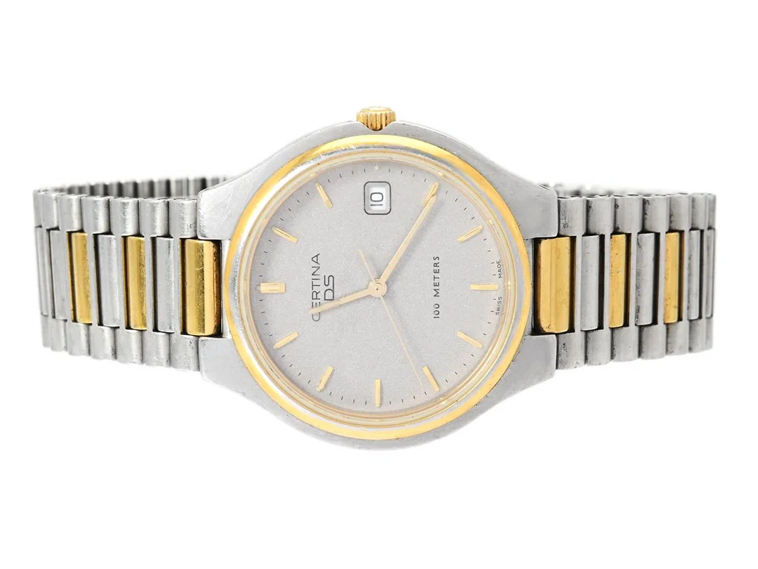 CERTINA, DS, Boett nr. 113.7060/7260/7360.44M, herrur, 34 mm, bicolour, quartz (går ej), safirglas, datum, skadad urtavla, integrerad originallänk, viklås, ca 1995. — Klockor/Certina — Kaplans