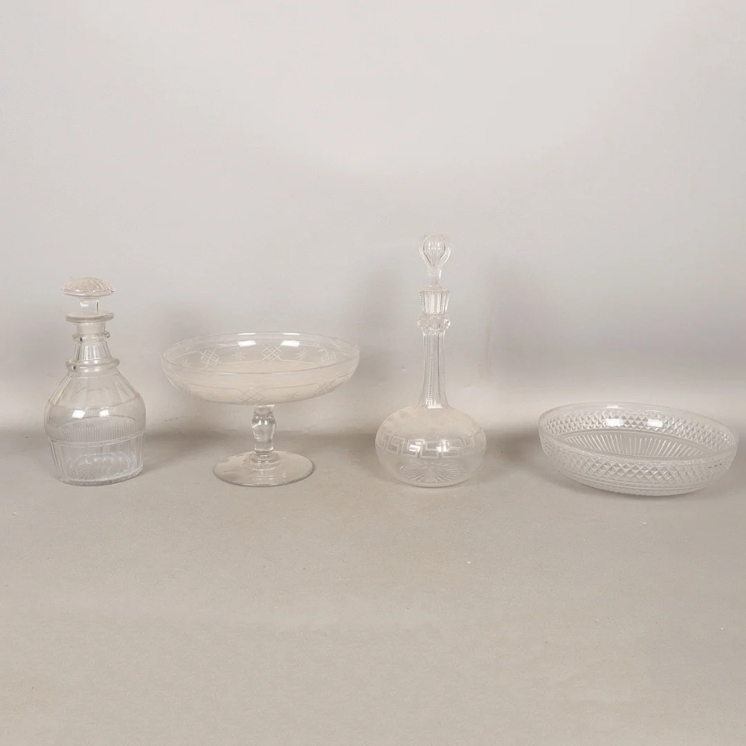 TWO CUT GLASS DECANTERS TOGETHER WITH A CUT GLASS BOWL AND A TAZZA (4). — Art glass — Bishop & Miller