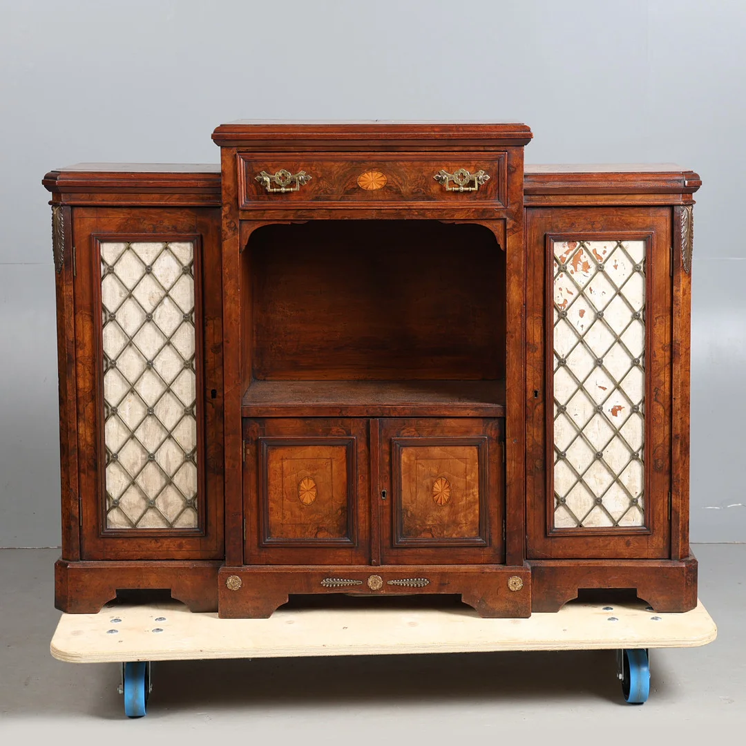 A 19TH CENTURY FIGURED WALNUT BREAKFRONT CABINET, CIRCA 1840. — Cupboards, Cabinets & Shelves — Bishop & Miller