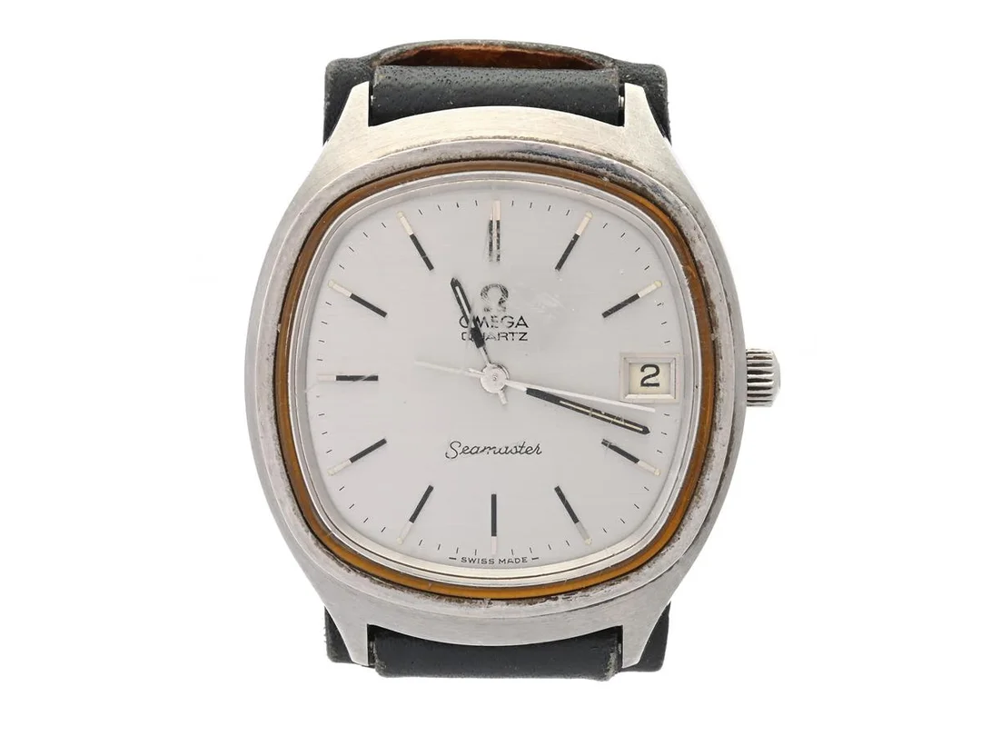 OMEGA, Seamaster, Cal 1315, Serie nr. 40008170, Ref nr. ST 196.0073, Boett nr. ST 196.0073 (K.B), herrur, 38 mm, stål, quartz, plexiglas, datum (centrerar ej), läderband, ca 1977. — Klockor/Omega — Kaplans
