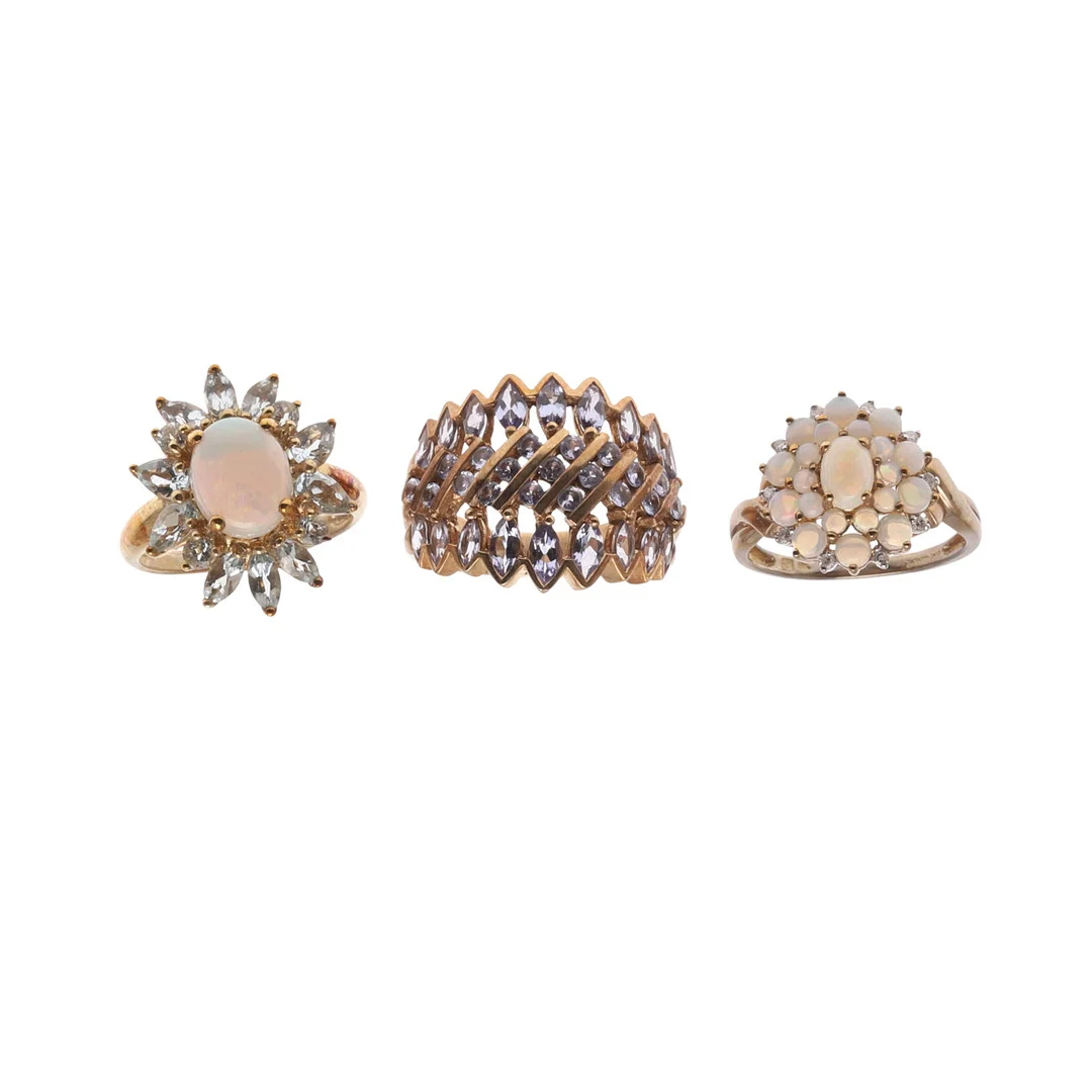 THREE 9CT GOLD AND GEM SET RINGS. — Rings — Lawrences Auctioneers
